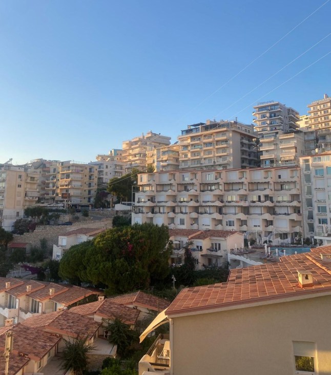 Apartment blocks against a blue sky in Sarande, Albania