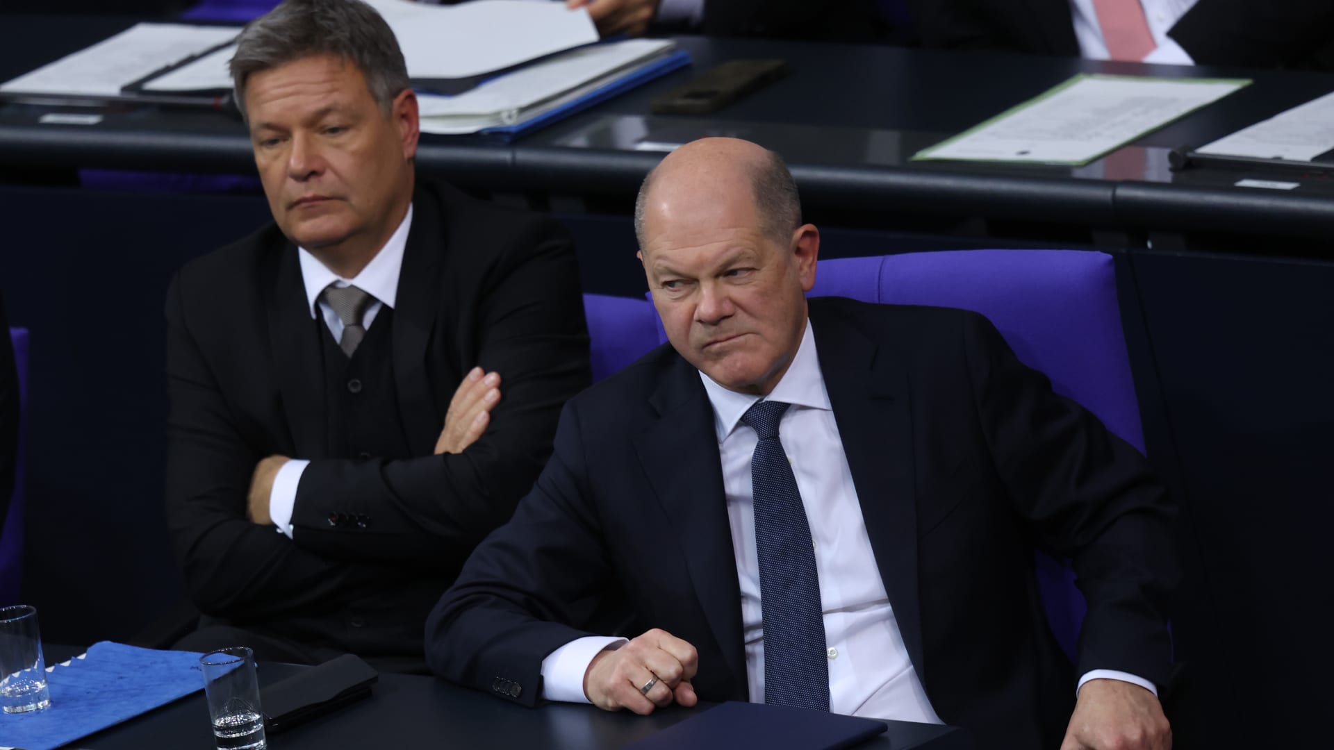 German Chancellor Olaf Scholz (R) and Economy and Climate Action Minister Robert Habeck attend debates before Scholz faced a vote of confidence at the Bundestag on December 16, 2024 in Berlin, Germany. 