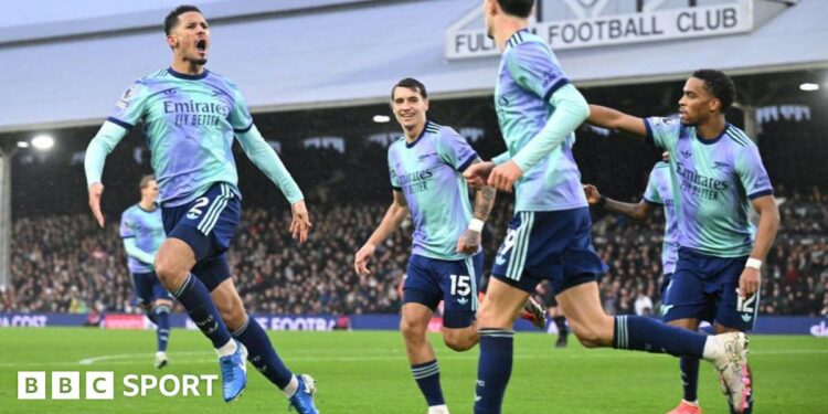 William Saliba celebrates  his goal against Fulham with his team-mates