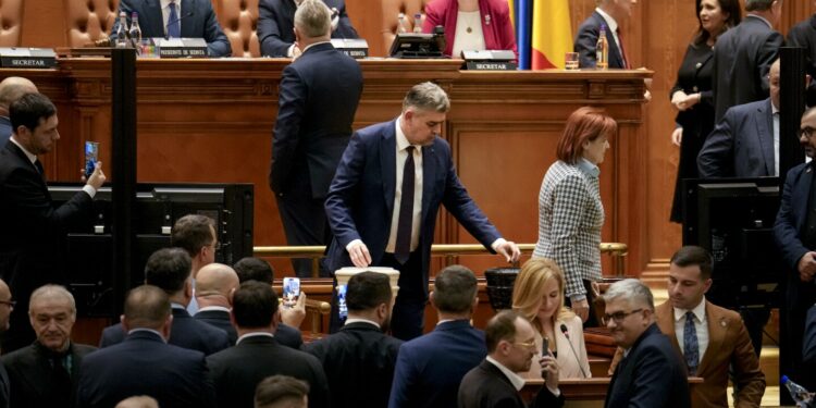 Romanian lawmakers narrowly approve new pro-European coalition during period of political turmoil