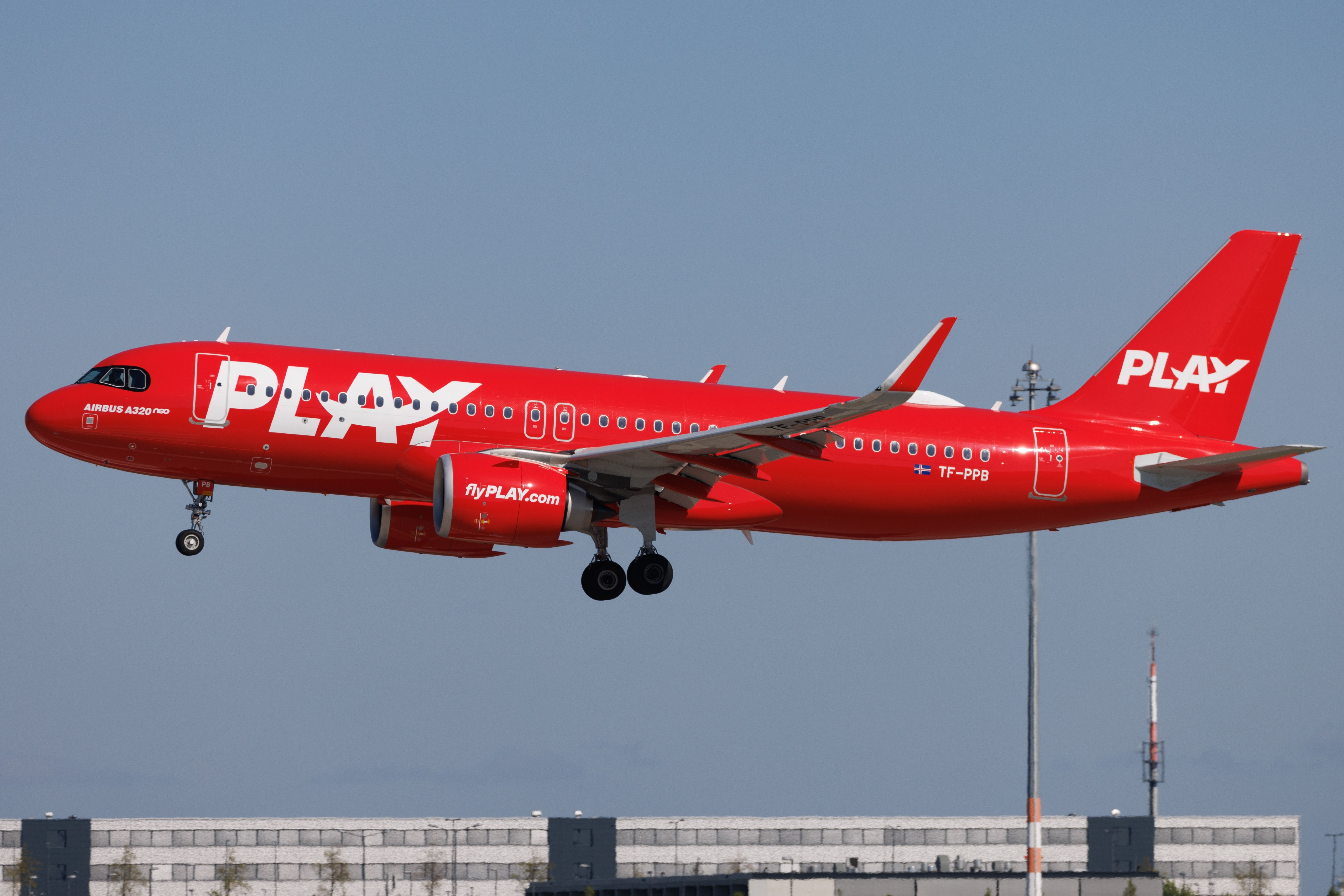 PLAY Airlines Airbus A320neo departing Berlin Brandenburg Airport BER shutterstock_2328516993