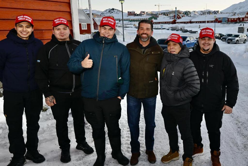 Donald Trump Jr. poses with Trump fans in Greenland. Instagram/Donald Trump Jr.