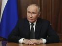 Russian President Vladimir Putin records a televised address in Moscow, Russia, Thursday, Nov. 21, 2024.