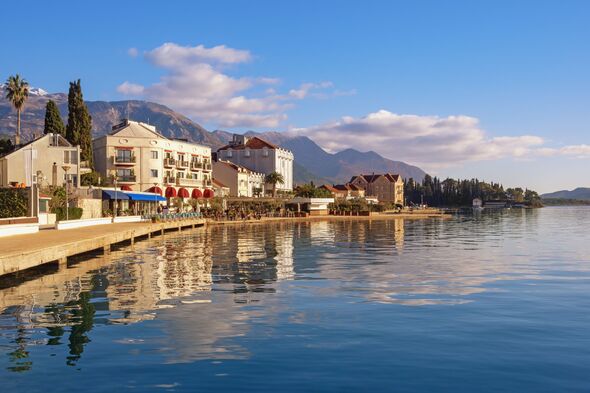 Beautiful Mediterranean landscape. Montenegro, Adriatic Sea. View of embankment of Tivat city and Bay of Kotor on sunny autumn day