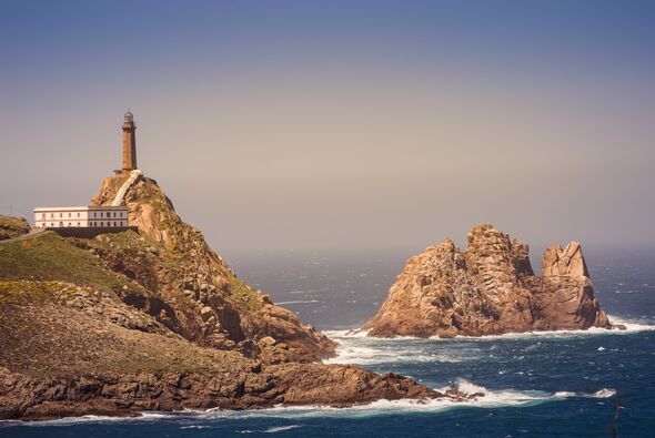 Cape Vilan lighthouse and Vilán de Fóra islet, Camariñas, Galicia, Spain