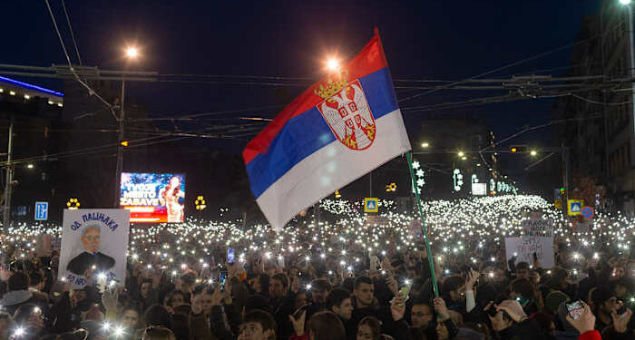 Driver rams into anti-government protesters in Serbia, seriously injuring a young woman