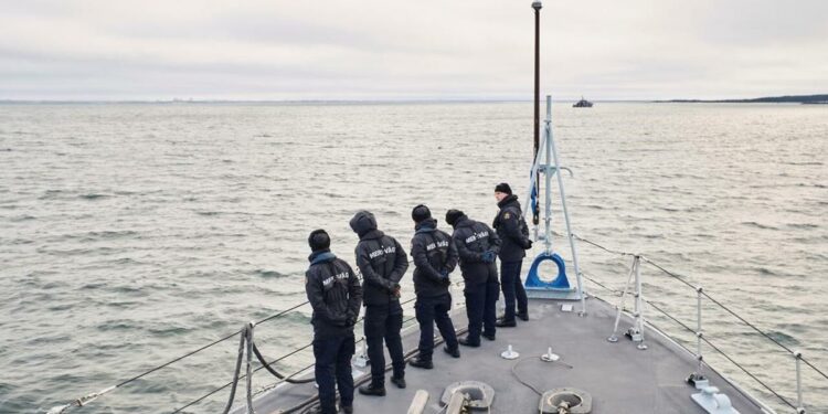 Estonia steps up patrols in the icy Baltic Sea in a show of force after suspected cable sabotage