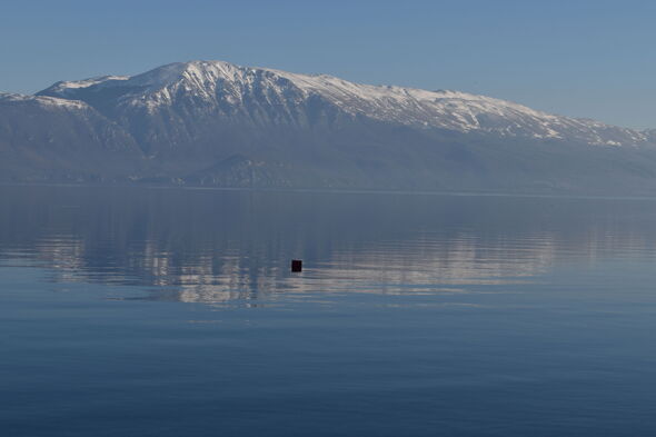 Scenic View Of Ohrid Lake And Mountains Against Sky In Winter Time