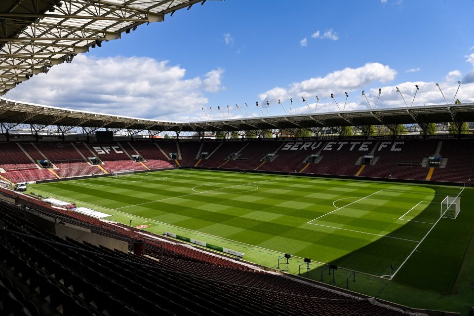 Stade de Genève soccer field before a UEFA Youth League match.