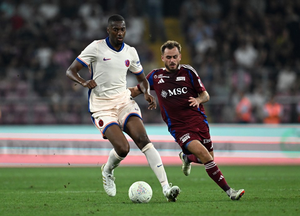 Tosin Adarabioyo of Chelsea dribbling the ball during a soccer match.