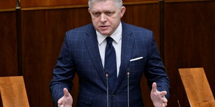 Slovakia PM accuses a grandmother of plotting coup, cites an FB photo with her ‘hero’ as evidence – Firstpost