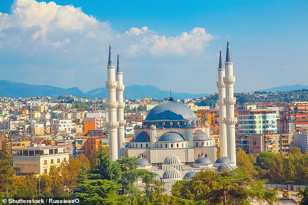 Albania is a secular country with no official religion, but 53 per cent of the population identify as Muslims. Pictured above is the country's largest mosque in Tirana