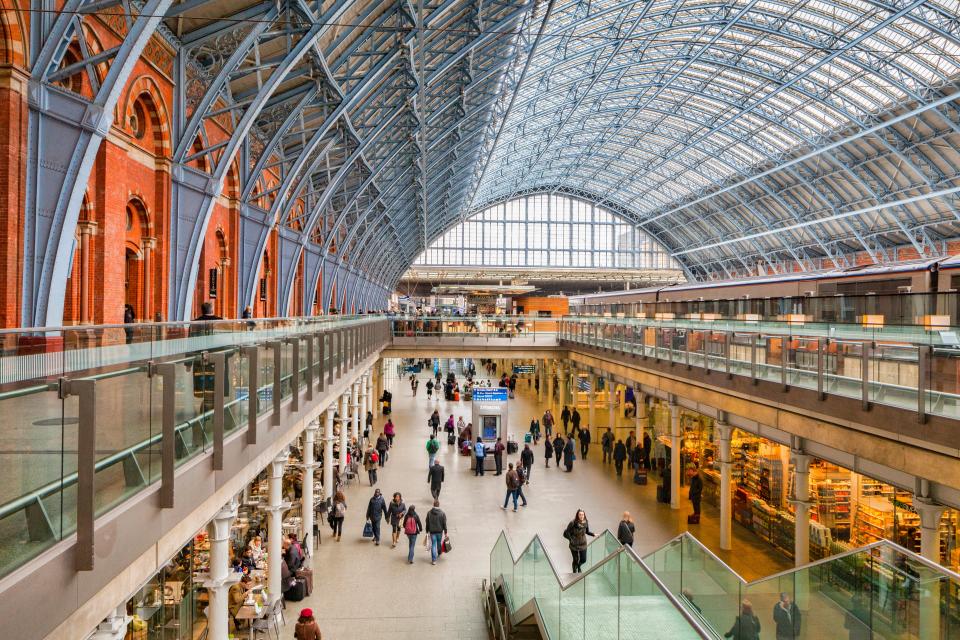 St. Pancras Station concourse with passengers.