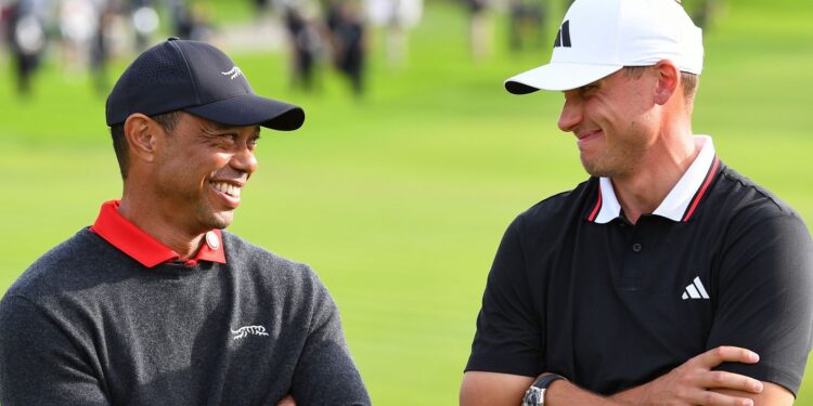 LA JOLLA, CA - FEBRUARY 16: Tiger Woods jokes with winner Ludvig Aberg during the trophy ceremony following the final round of The Genesis Invitational 2025 at Torrey Pines Golf Course on February 16, 2025 in La Jolla, California. (Photo by Brian Rothmuller/Icon Sportswire) (Icon Sportswire via AP Images)