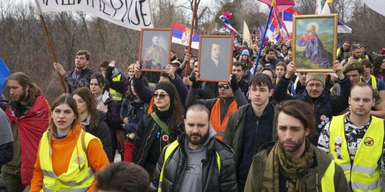 Marching university students in Serbia receive jubilant welcome on the eve of a big anti-graft rally